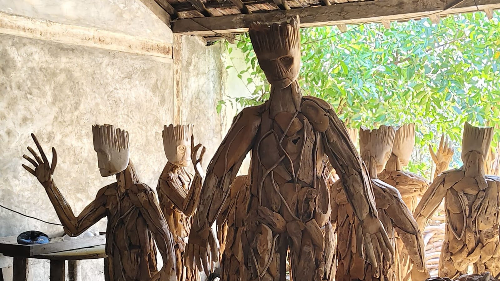 Handcrafted wooden animal sculpture from reclaimed teak root