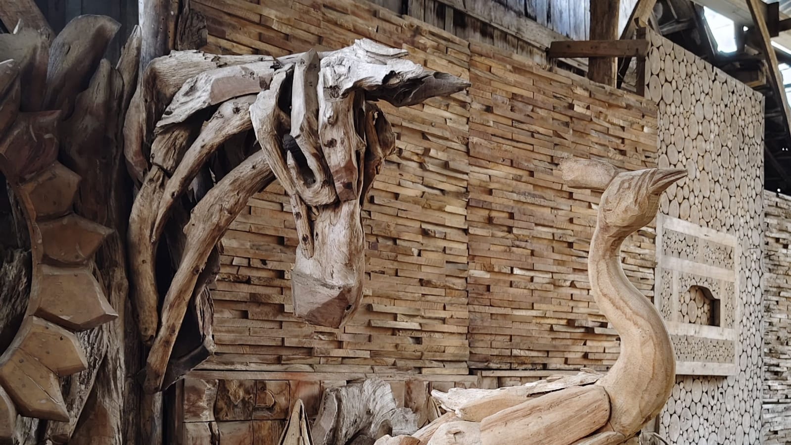 Wooden animal sculpture displayed in a modern interior